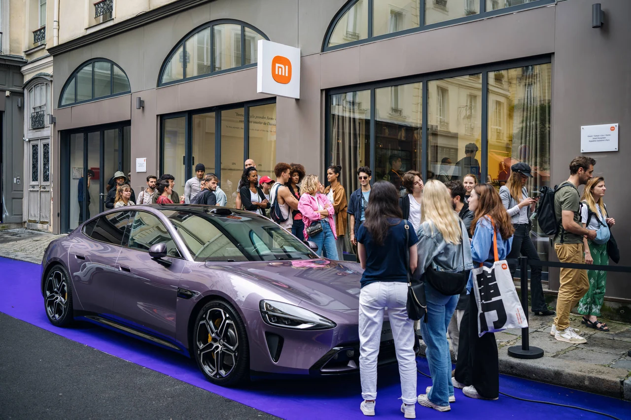 Visitors outside the Xiaomi exhibition in Paris